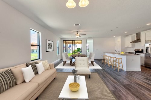 2929-Casabella-Dr--Kissimmee--FL-34744---05.2---Virtual-Staging--Dining-Family-Room.jpg